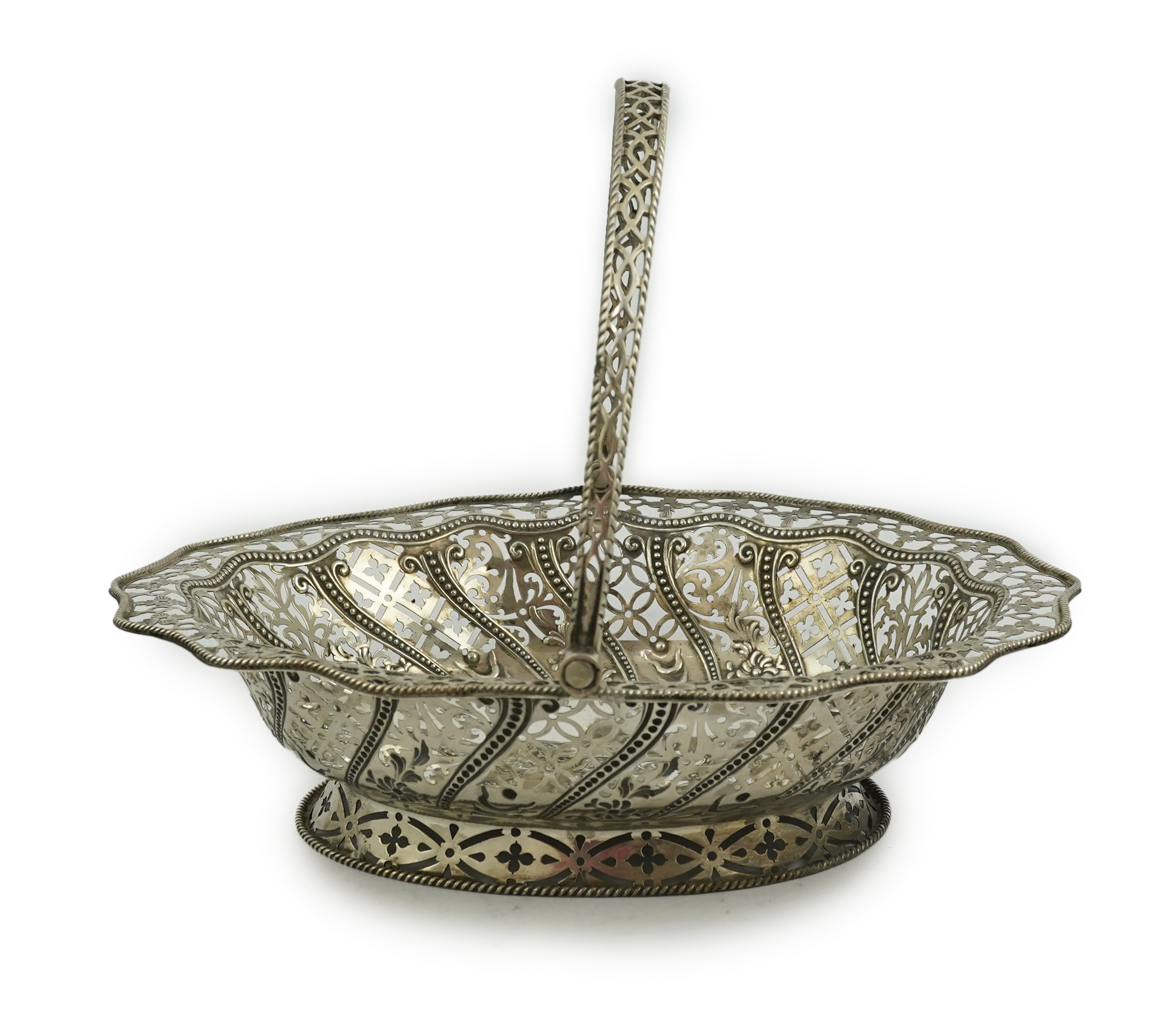 A George III pierced repousse silver cake basket